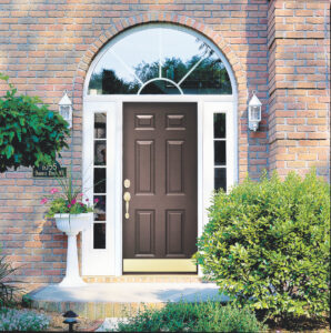 Home with dark brown entry door